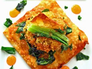 Close Up of New Year's Crab Wontons on a White Plate